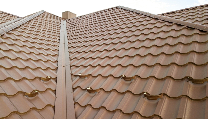 Close-up of a metal roofing surface, emphasizing its quality, associated with roof replacement considerations in Connecticut.