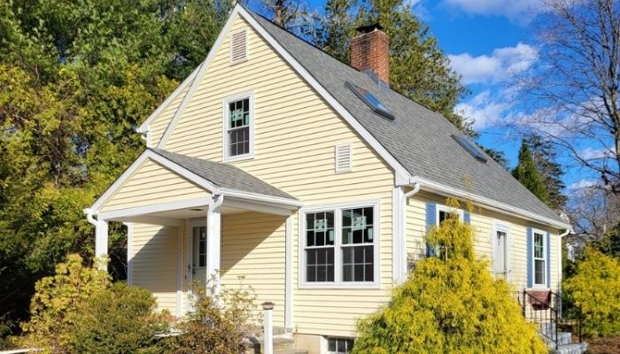 Connecticut home with new siding illustrating siding cost and permit considerations